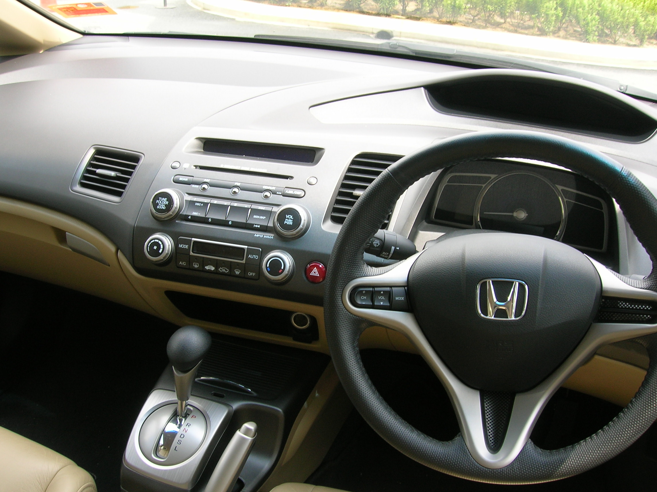 Interior’s standard Honda Civic.